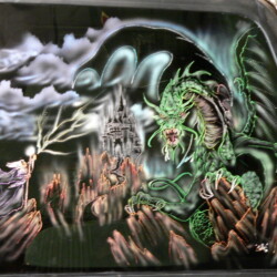 A dragon painted on a car window.