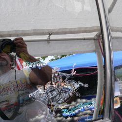 A man is taking a picture of himself in a mirror.