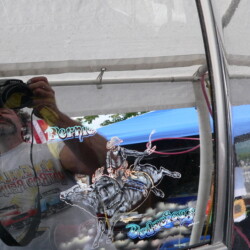 A man is taking a picture of himself in a mirror.