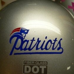 A helmet with the word patriots on it.