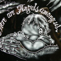 A black and white drawing of a baby with the words there angels are among us.