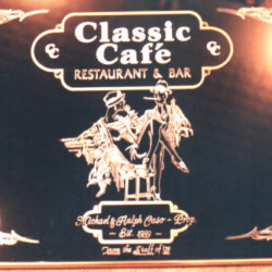 A sign that says classic cafe restaurant and bar.