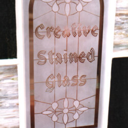 A sign that says creative stained glass.