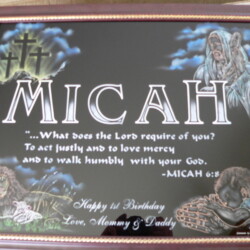 A framed plaque with the word michael on it.