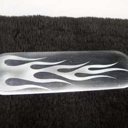 A metal plate with flames on it.