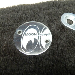 The moon eclipse logo is shown on a piece of cloth.