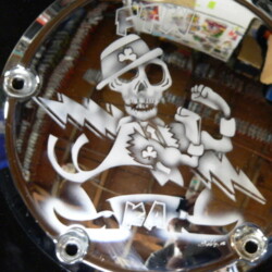 A mirror with an image of a skeleton on it.