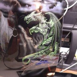A helmet with a dragon on it.