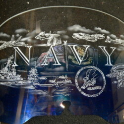 A motorcycle windshield with the word navy on it.