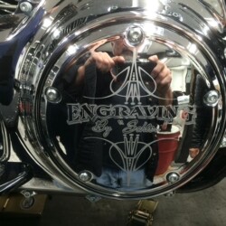 An image of a motorcycle with the word engrave on it.
