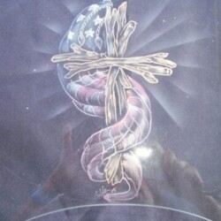 A glass plate with a cross and an american flag on it.
