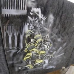 A picture of a firefighter on a piece of paper.