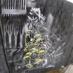 A picture of a firefighter on a piece of paper.